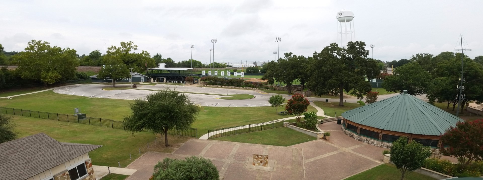 Fireman's park with the antique carousel building and in the distance fireman's baseball field and a water tower
